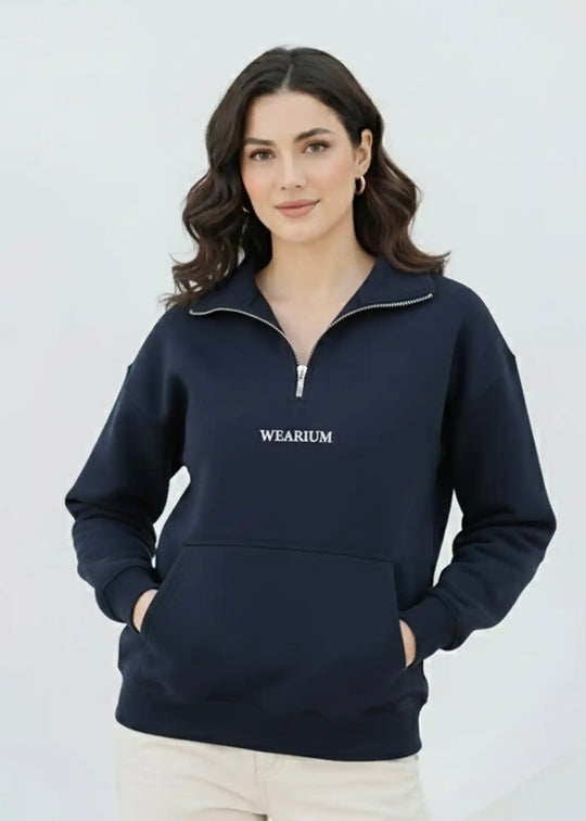 Woman wearing a navy blue sweatshirt with 'WEARIUM' branding on a white background